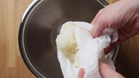 Transferring Sticky Rice From Kitchen Cloth Into Bowl Top View Close Up Stock Footage 335040933
