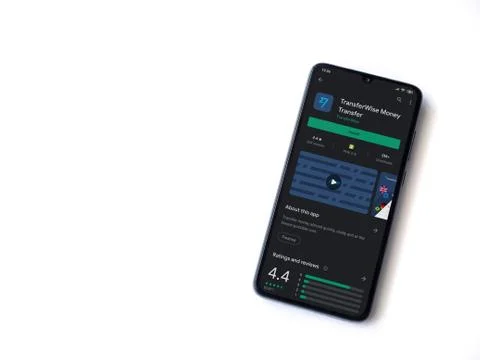 TransferWise app play store page on the display of a black mobile smartphone  Stock Photos