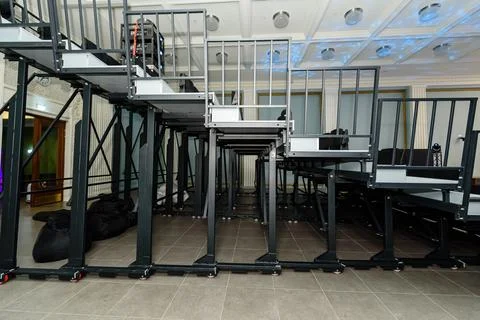 Transformable spectator stand, tribune, collapsible rostrum,, row of stacke Stock Photos