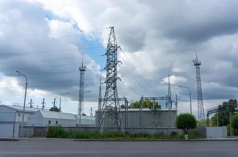 Transformer high-voltage substation in cloudy weather Stock Photos
