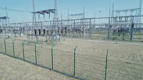 Transformer station, energy security of countries. A power station surrounded Stock Footage 185524348