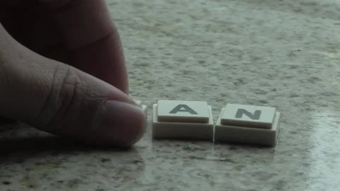 Transforming letters into meaning at a cozy workspace Stock Footage 323792533