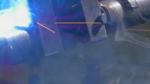 Transforming Metal Pipes With Precision From an Argon Welding Robot Stock Footage 340486697