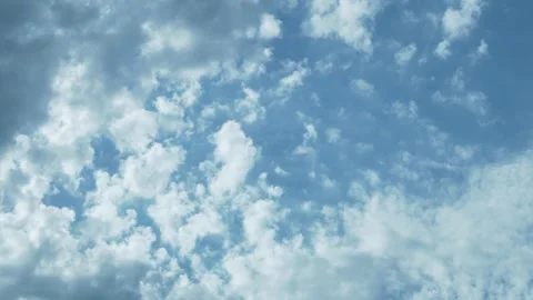 Transforming White Clouds in a Blue Sky in Sunny Weather. Background of White Cl Stock Footage 153807831