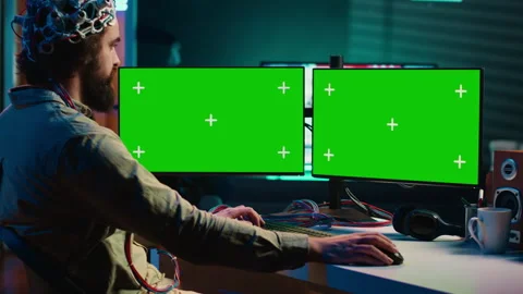 Transhumanist using neuroscience to gain digital soul through chroma key PC Stock Footage 266951068