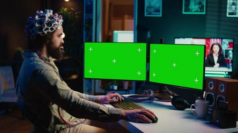 Transhumanist using neuroscience to gain digital soul through chroma key PC Stock Footage 266953098