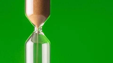 The transience of time. Hourglass on a colored background close-up 스톡 동영상 121466586