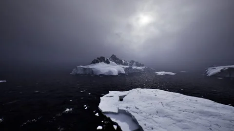 Transient shimmer reflecting on shattered icy expanses and dark sea Stock Footage 339618692