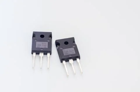 Transistor mounted on a breadboard with a white background. Stock Photos