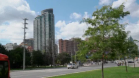 Transit Bus approaching bus stop. People waiting. intentially blurred. Stock Footage 76200910