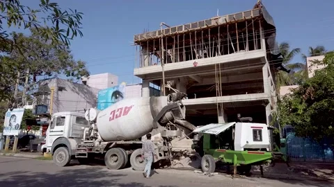 A Transit Concrete Mixer at work  at aa construction  site in Mysore, India. Stock Footage 155434550