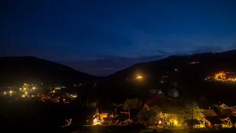 The transition from day to night in the mountains, train, lights, clouds 動画素材 73924554