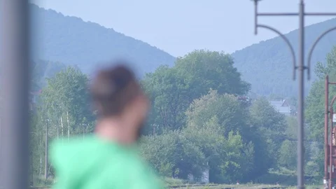 The transition of the focus from the background to the foreground. Video stock 95941126