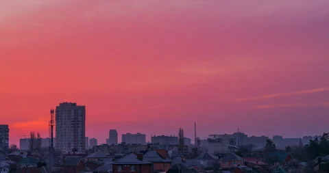 Transition from night to dawn against the backdrop of the cityscape Stock Footage 105791410