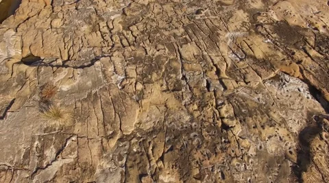 Transition from a rocky beach on a ocean view aerial view Stock Footage 64639767