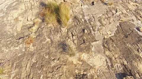 Transition from a rocky beach on a ocean view aerial view Stock Footage 64697569