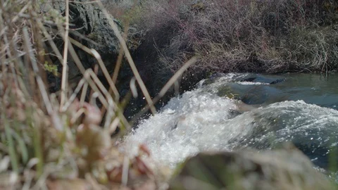 Transition from Smooth stream to powerful waterfall Stock Footage 95986179