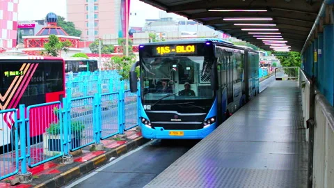 Transjakarta arrive at Blok M 2 Stock Footage 332578786