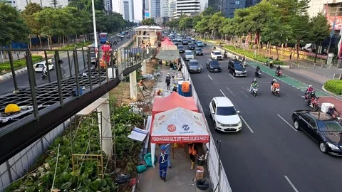 Transjakarta bus stop construction project on Sudirman Street. Stock Footage 248907841