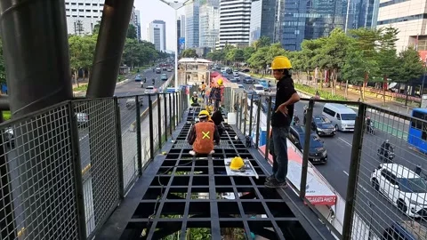 Transjakarta bus stop construction project on Sudirman Street. Stock Footage 248907930