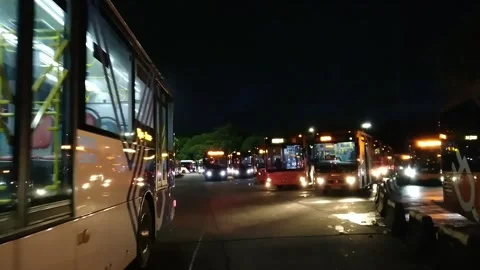 Transjakarta buses started operating at Kampung Rambutan bus station in Jakarta Stock Footage 328489077