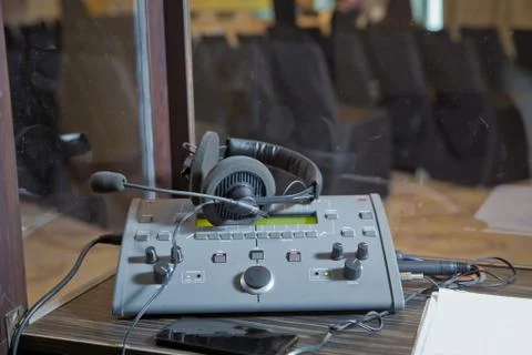 Translators cubicle . interpreting - Microphone and switchboard in an simulta 写真素材
