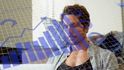 Translucent 3D grid appearing triggers man using laptop shifting gaze as blue Stock Footage 333632324
