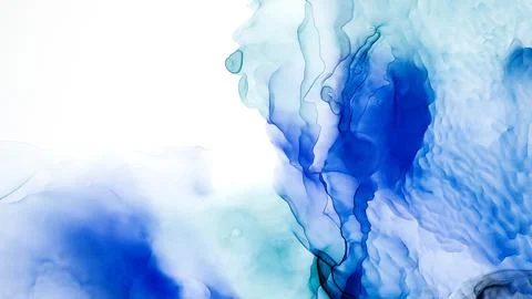 Translucent Alcohol ink on white backdrop. Modern background. Abstract smud.. Stock Photos