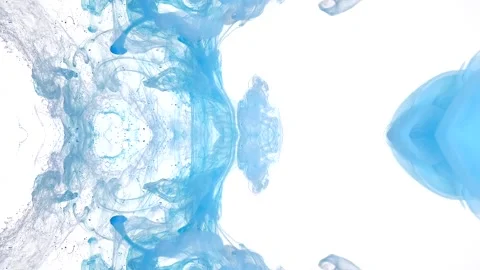 Translucent blue ink drifts across a bright mirrored composition Stock Footage 338105493