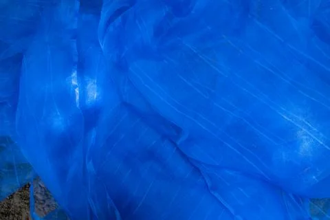 Translucent blue net fabric can be used as a background wallpaper Stock Photos
