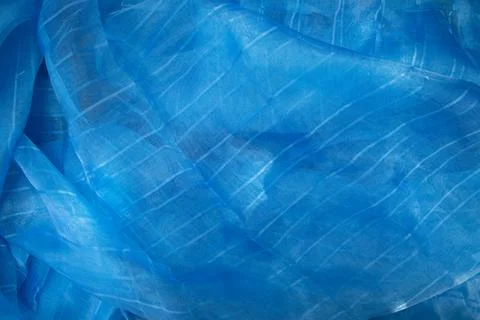 Translucent blue net fabric can be used as a background wallpaper Stock Photos