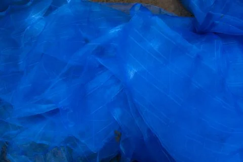 Translucent blue net fabric can be used as a background wallpaper Stock-Fotos