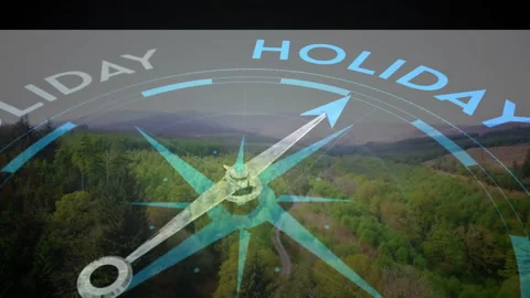 Translucent compass rose spinning over forest valley showing HOLIDAY letters and Stock Footage 309109476
