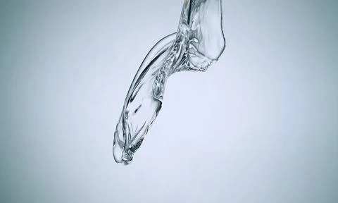 A translucent, flowing liquid forms a graceful curve against Stock Photos