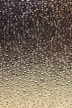Translucent Glass Close-up Surface with Refractive Light Foto stock
