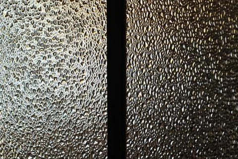 Translucent Glass Close-up Surface with Refractive Light Foto stock