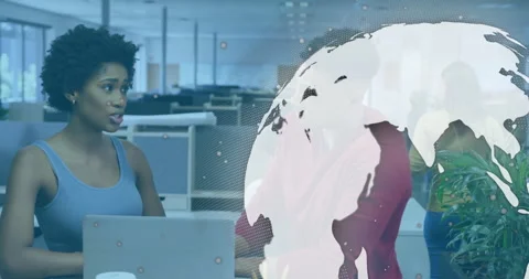Translucent globe drifting across screen driving developers reviewing code Stock Footage 314849386