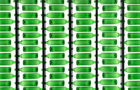 Translucent green bottles pattern Stock Photos
