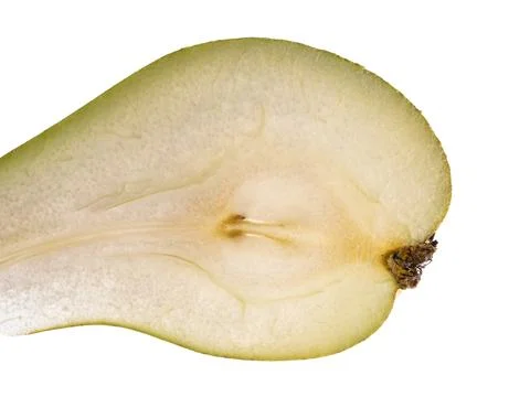 Translucent half slice of fresh green pear isolated on white background Foto stock