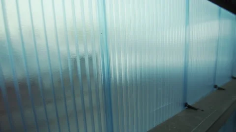 Translucent light blue reinforced polycarbonate hollow panel Stock Footage 231220296