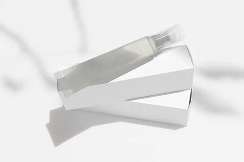 Translucent lip gloss tube packging with box, liquid lipstick tube Stock Illustration