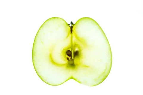 Translucent luminous transverse section of green apple  Stock Photos