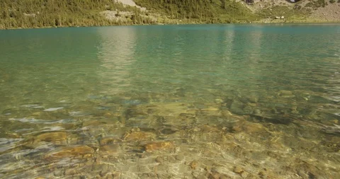 Translucent mountain lake in Canada Video stock 121544437