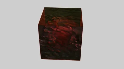 A translucent red cube with a textured surface rotates on a light background. lo Stock Footage 162103522