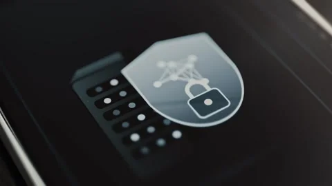 Translucent shield with a padlock and connected nodes overlays a dark server 動画素材 343374519