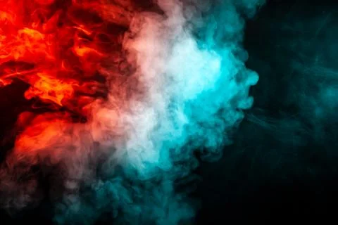 Translucent, thick smoke, illuminated by light against a dark background, div Stock Photos