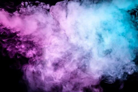 Translucent, thick smoke, illuminated by light against a dark background, div Stock Photos