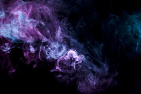 Translucent, thick smoke, illuminated by light against a dark background, div Stock Photos