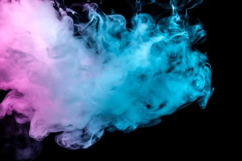 Translucent, thick smoke, illuminated by light against a dark background, div Stock Photos