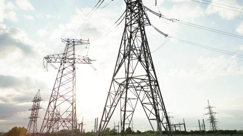 A transmission line tower showcasing the scale of Stock Footage 249700046